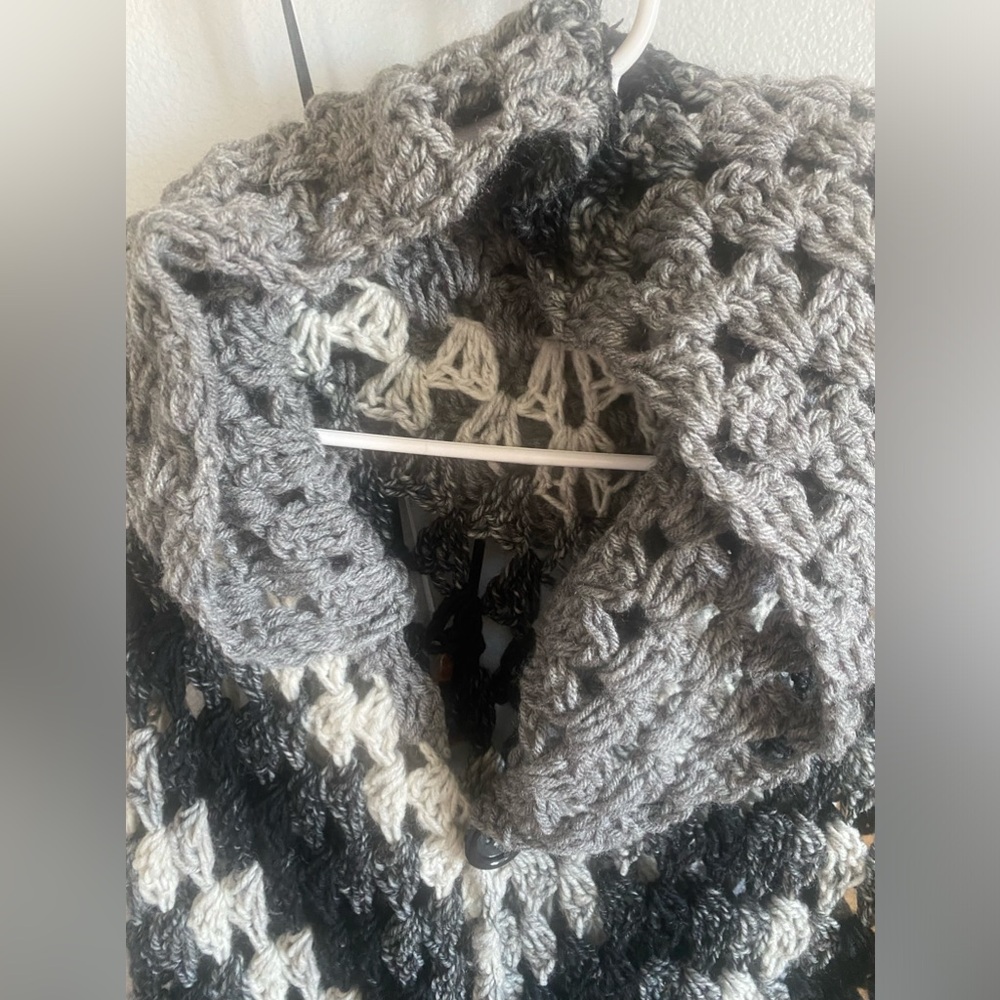 Hand made crochet hooded cape with sleeves.